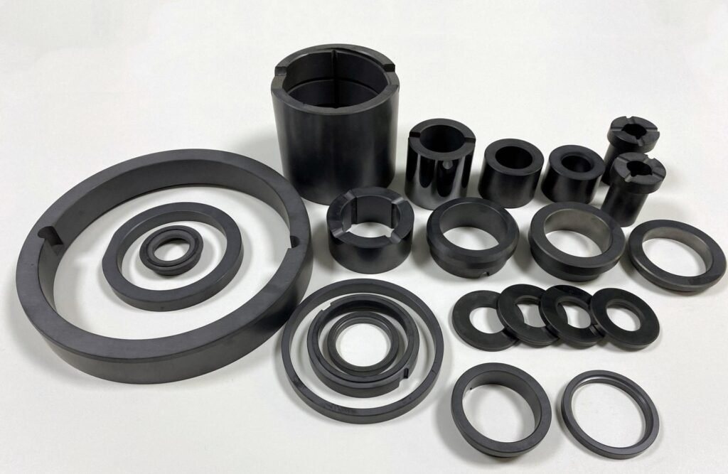 Black silicon carbide bushings and bearing cages, machined from sintered SiC